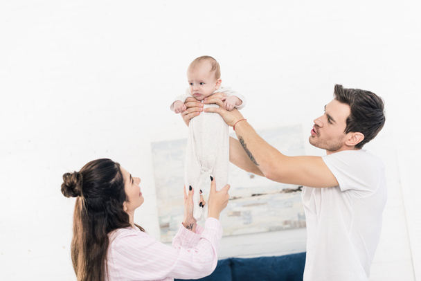 young family with little son at home - Foto, Bild