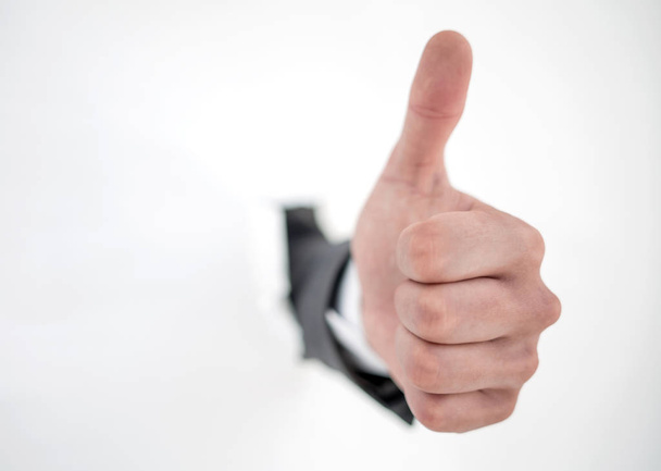 close up.businessman showing thumb up - Foto, afbeelding