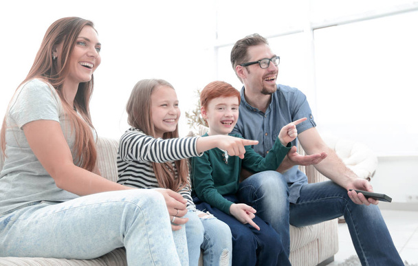 happy family watching their favorite TV show. - Fotoğraf, Görsel