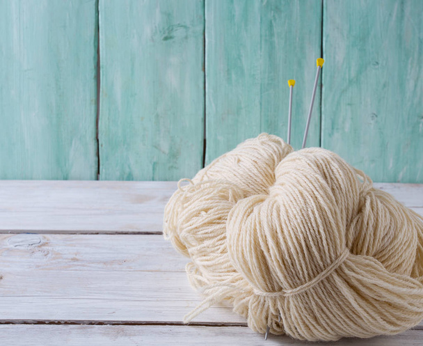 knitting yarn hanks on wooden surface - Valokuva, kuva