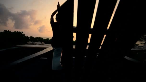 Female Practicing Yoga Overlooking the Ocean - Felvétel, videó