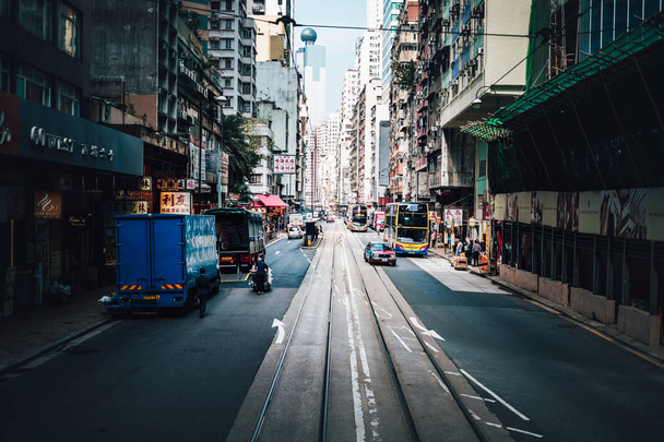 Street with people and transport during daytime, Hong Kong - Fotografie, Obrázek
