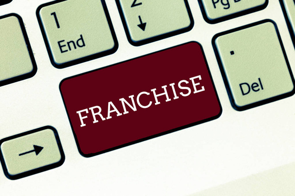 Handwriting text Franchise. Concept meaning authorization granted by government or company to individual group Keyboard key Intention to create computer message, pressing keypad idea. - Photo, Image