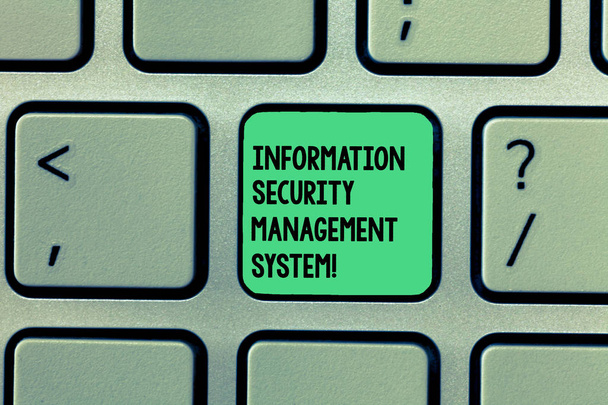 Writing note showing Information Security Management System. Business photo showcasing IT safety secure technology Keyboard Intention to create computer message keypad idea. - Photo, Image