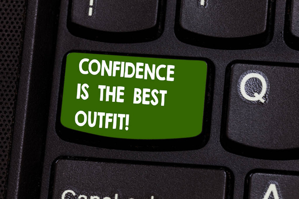 Handwriting text writing Confidence Is The Best Outfit. Concept meaning Selfesteem looks better in you than clothes Keyboard key Intention to create computer message pressing keypad idea. - Photo, Image
