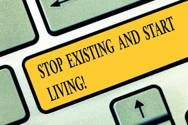 Conceptual hand writing showing Stop Existing And Start Living. Business photo text Enjoy have more leisure family moments Keyboard key Intention to create computer message idea. - Photo, Image