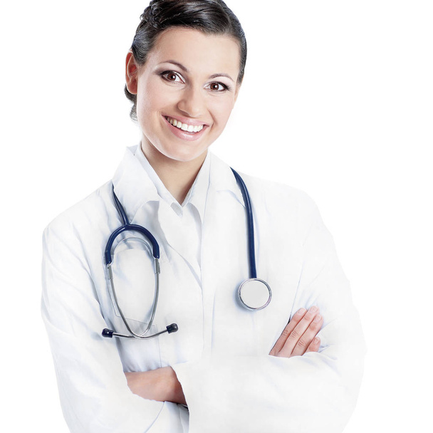 Attractive woman doctor. Isolated in the white background. - Photo, image
