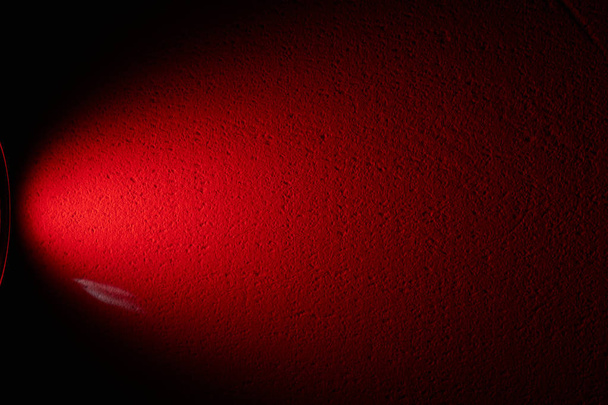 Red beam on a black background - Photo, Image