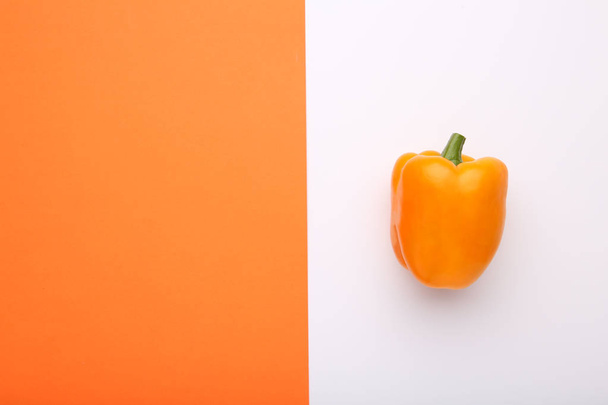 Yellow pepper on colorful background with copy space - 写真・画像