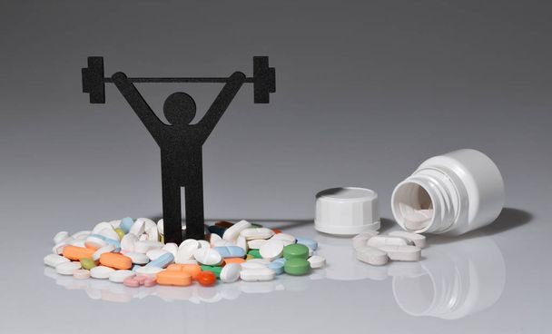 Gewichtheffen pictogram met pillen en grijze achtergrond - Foto, afbeelding