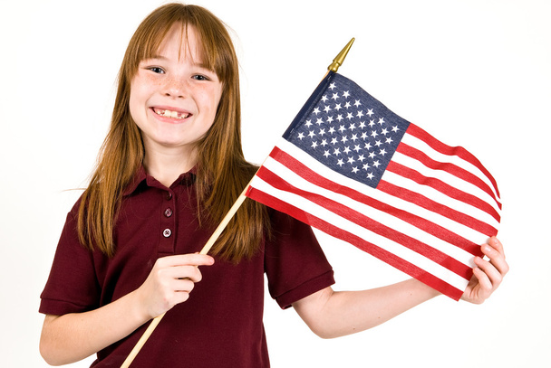 Young girl holding an American Flag - Photo, Image