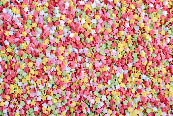 Colorful Sugar Star Sprinkles Background, top view - Foto, Imagen