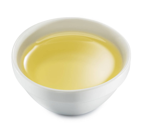 Bowl with olive oil. File contains clipping path. - Photo, image