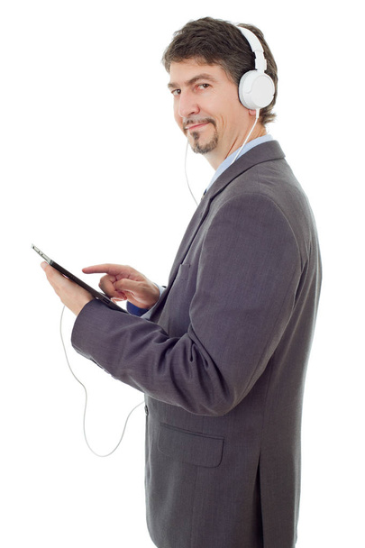 businessman with tablet pc and headphones, isolated - Foto, Imagem