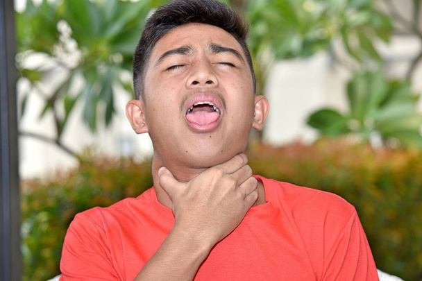 A Male Youngster Choking - Fotografie, Obrázek