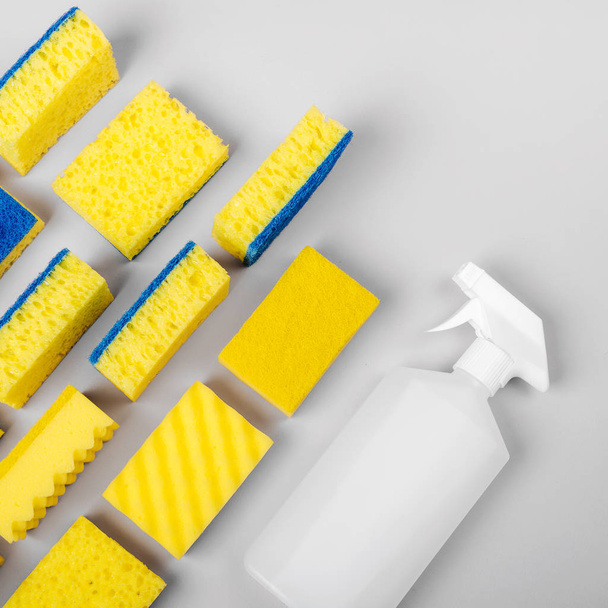 Sponges on gray background. Cleaning or housekeeping concept background. Copy space. Flat lay, Top view. - Valokuva, kuva