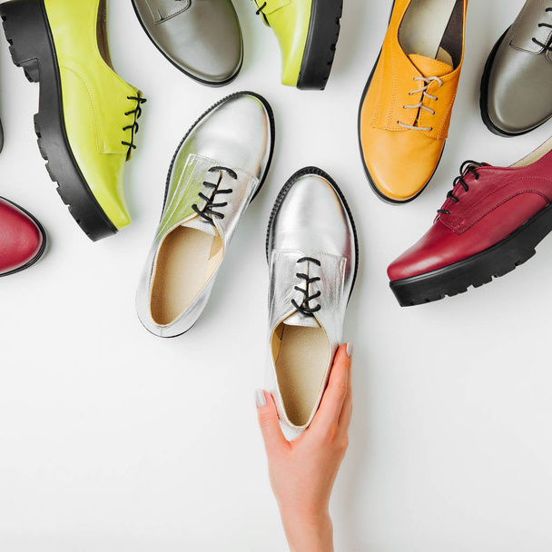 Stylish female spring or autumn shoes in various colors. Beauty and fashion concept. Flat lay, top view - Foto, Bild