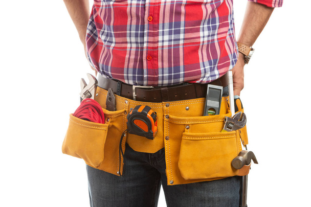Close-up of builder or construction worker tool belt isolated on white studio background - Foto, Imagem