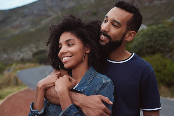 smiling happy african american couple in love together hugging  - Zdjęcie, obraz