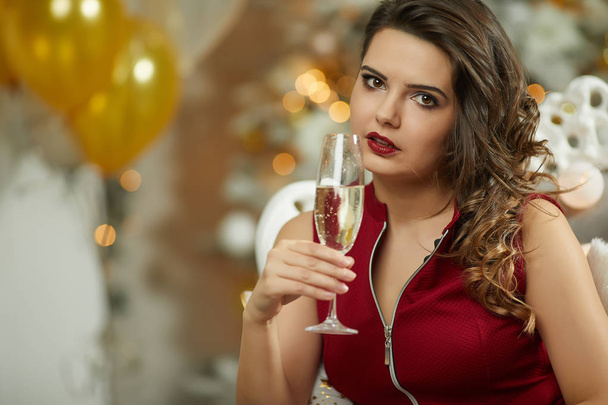 Smiling Woman Holding Glass Of Sparkling Wine Stock Photo  - Foto, afbeelding