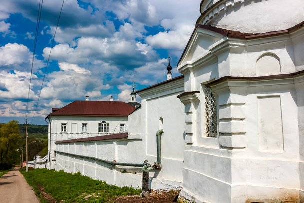 MALOYAROSLAVETS, RUSSIA - MAY 2016: Territory of the Svyato-Nikolskiy Chernoostrovskiy convent monastery in Maloyaroslavets. Fence - Photo, image