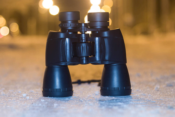 Binoculars closeup in the winter season. Evening time of day - Zdjęcie, obraz