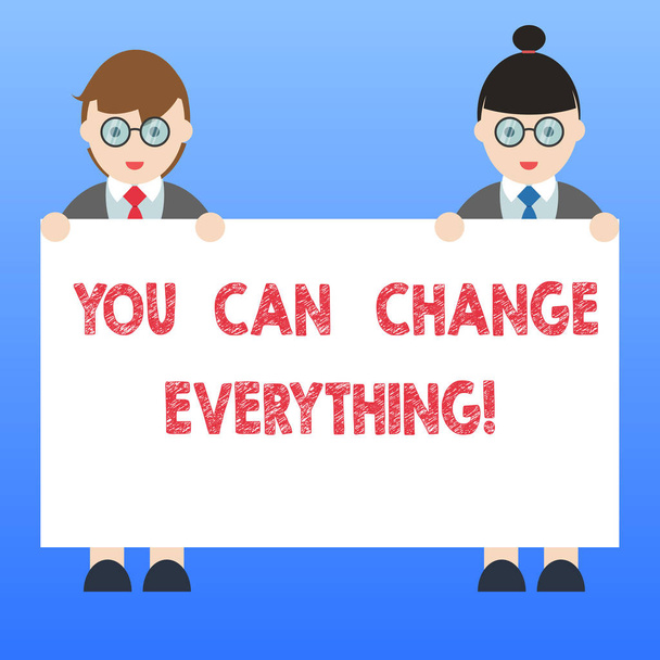 Handwriting text You Can Change Everything. Concept meaning In your hands are the changes you want to make Male and Female in Uniform Standing Holding Blank Placard Banner Text Space. - Photo, Image