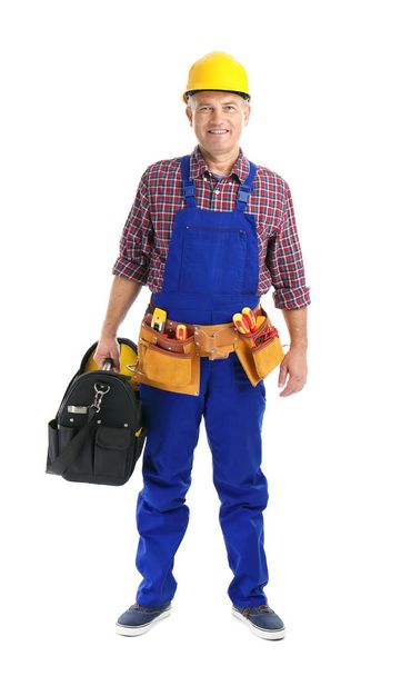 Electrician with tools wearing uniform on white background - Foto, Imagem