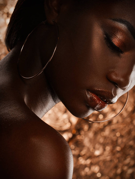 Portrait of Young African model with a beautiful makeup in studio - Foto, imagen