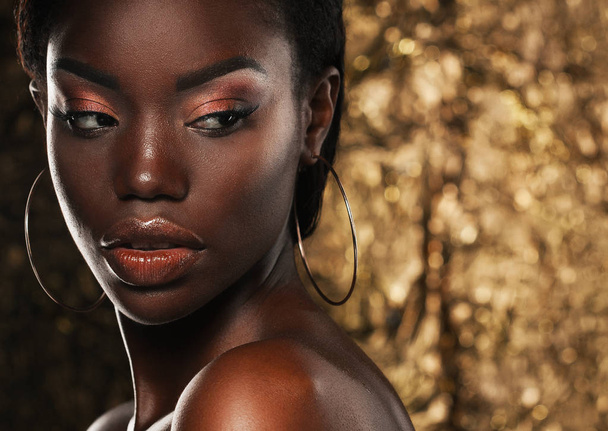 Stunning Portrait of an African American Black Woman over golden background - Fotó, kép