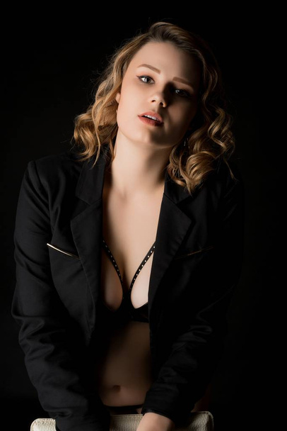 Pretty blonde in jacket and stockings shot - Foto, Imagem