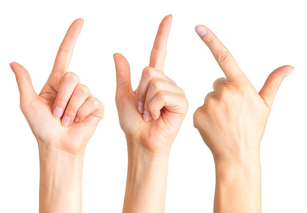 Mãos de mulher com o dedo indicador apontando para cima
 - Foto, Imagem