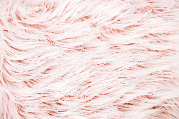 Pink fluffy fur background.  Flat lay, top view - Fotó, kép