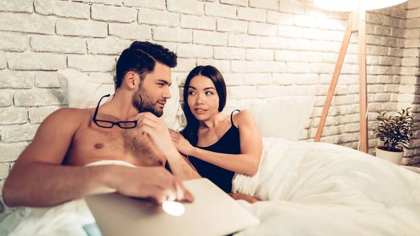 Cute Couple in Love Lying bed Ready To Having Sex - 写真・画像