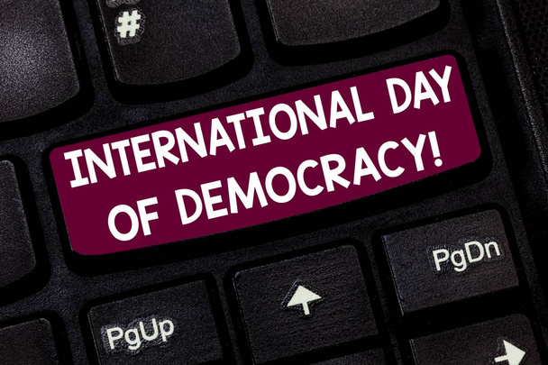 Conceptual hand writing showing International Day Of Democracy. Business photo text Celebrating voting rights around the world Keyboard key Intention to create computer message idea. - Photo, Image