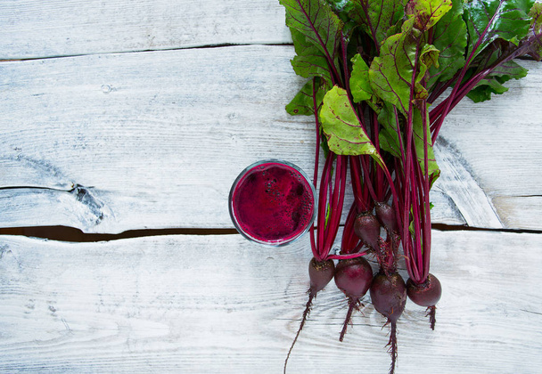 beetroot juice on wooden surface - Foto, immagini