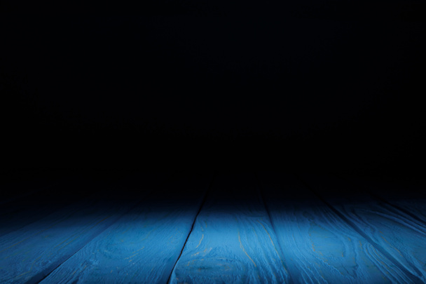 blue striped wooden tabletop on black - Photo, Image