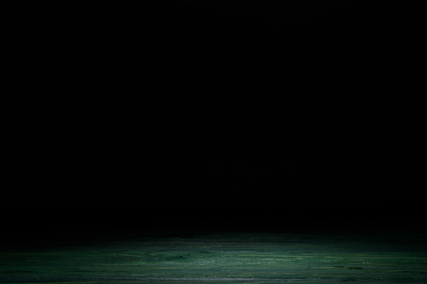 dark green striped wooden tabletop on black - Φωτογραφία, εικόνα