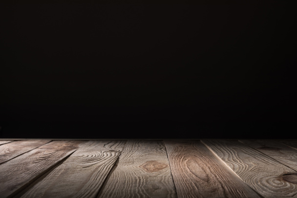 brown striped wooden background on black - Photo, Image
