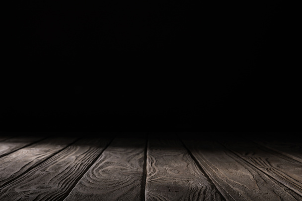 brown striped wooden tabletop on black - Valokuva, kuva