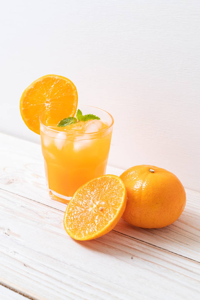 glass of orange juice with ice - Foto, Imagem