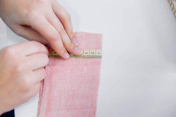 female hands are using a sewing machine - Φωτογραφία, εικόνα