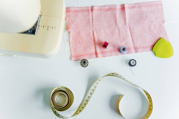 Creative sewing supplies and accessories on a table - 写真・画像