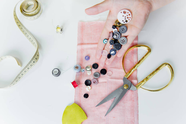 Creative sewing supplies and accessories on a table - Photo, image