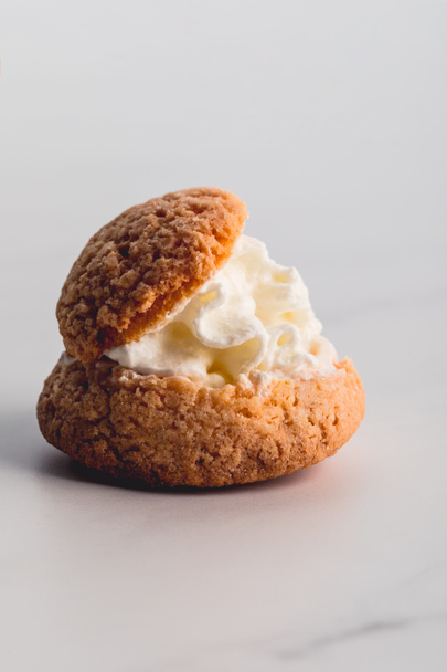 close up of sweet oatcake with whipped cream - 写真・画像