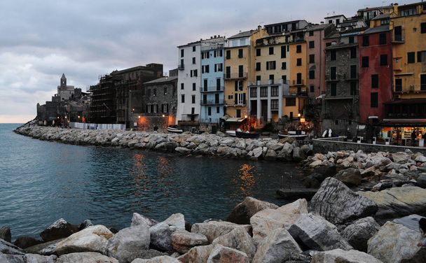 Liguria, Olaszország, Portovenere városkép naplementekor - Fotó, kép