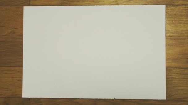 Crumpled piece of white paper. Stop motion animation. - Séquence, vidéo