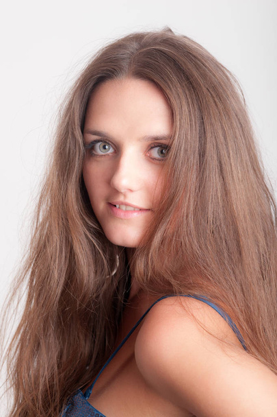 studio portrait of a girl with long hair - Фото, изображение