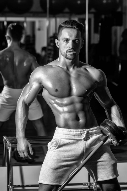 muscular man with barbell - Φωτογραφία, εικόνα