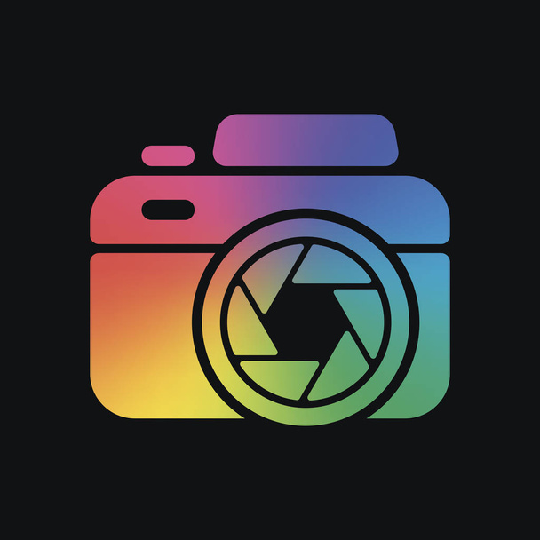 Photo camera with shutter, simple icon. Rainbow color and dark background - Vektor, kép